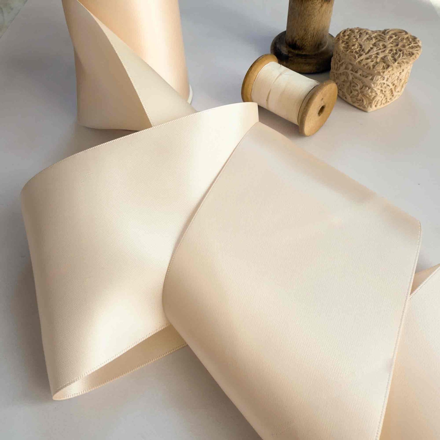 nude satin ribbon 10cm wide. Extra wide satin ribbon for chair covers and decoration.