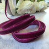 6mm narrow velvet ribbon on a 3 meter roll.  Deep burgundy colour