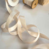 narrow satin ribbon in pretty nude colour.  13mm wide.