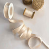 16mm wide satin ribbon in nude colour.  Pretty neutral satin ribbon