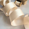 nude colour satin ribbon 38mm wide.  Sold by the meter.