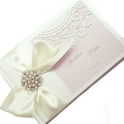 Big Bow wedding invitation with doily accents 