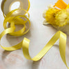 13mm wide satin ribbon in lemon yellow.  Narrow ribbon by the roll or metre