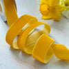 mustard yellow velvet ribbon on a 3 metre roll.  25mm wide.  1 inch wide velvet ribbon