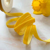 narrow velvet ribbon sold on 3 metre rolls.  9mm wide mustard yellow velvet ribbon