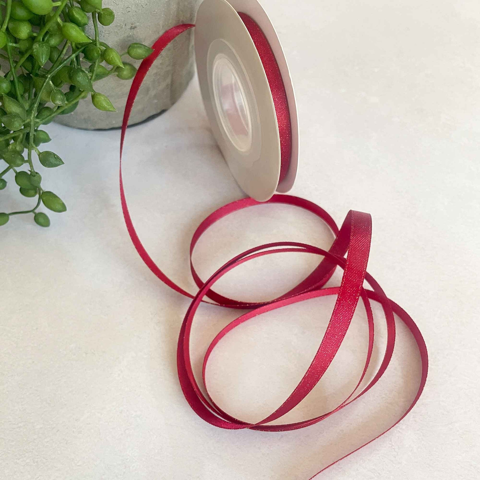 narrow red sparkle ribbon