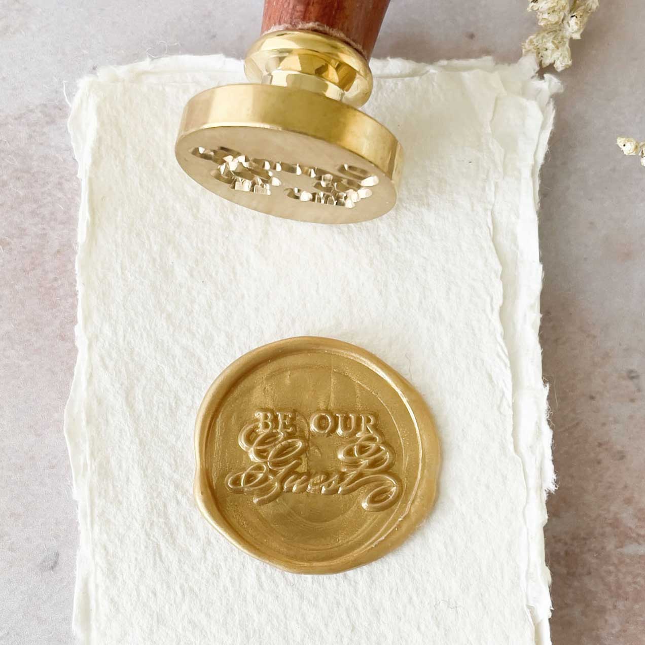 Be-our-guest-wax-invitation-stamp