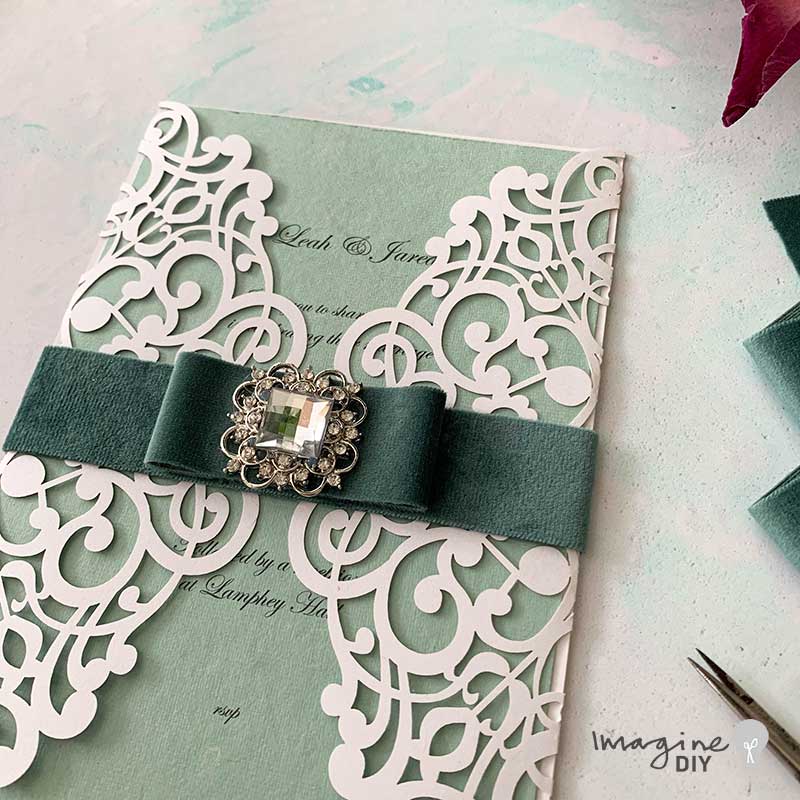DIY_wedding_invitation_with_simple_dior_bow_and_embellishment
