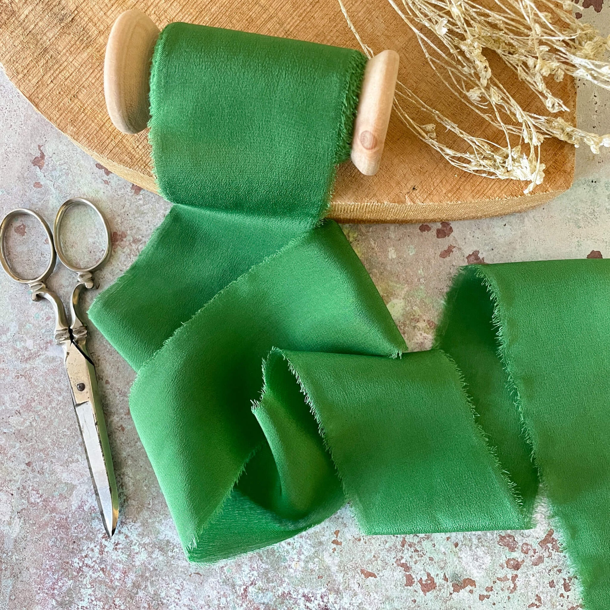 roll-of-silk-ribbon-in-emerald-green