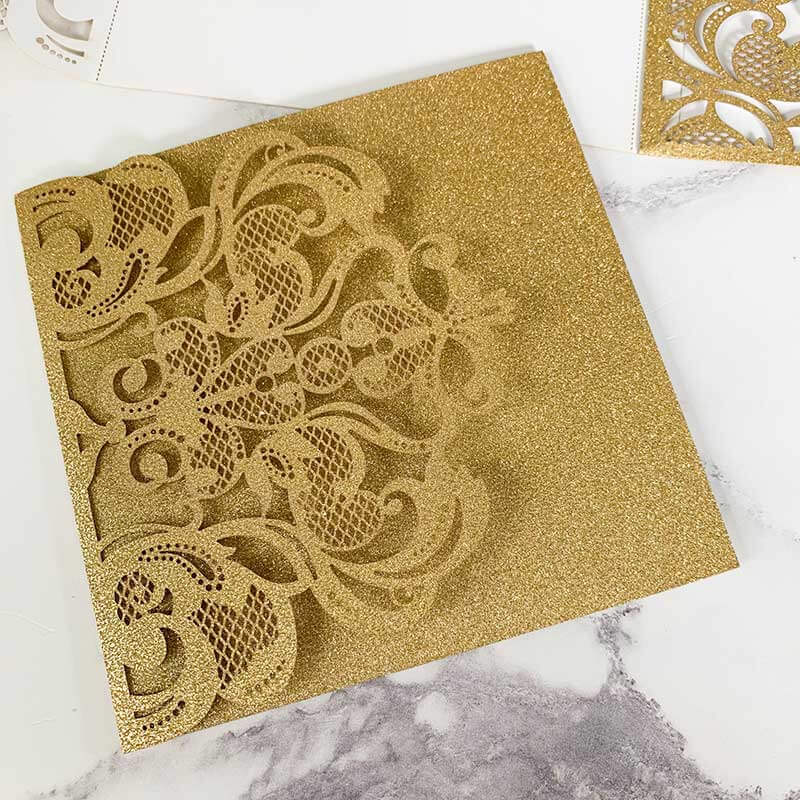 blank-laser-cut-invitation-in-gold-glitter