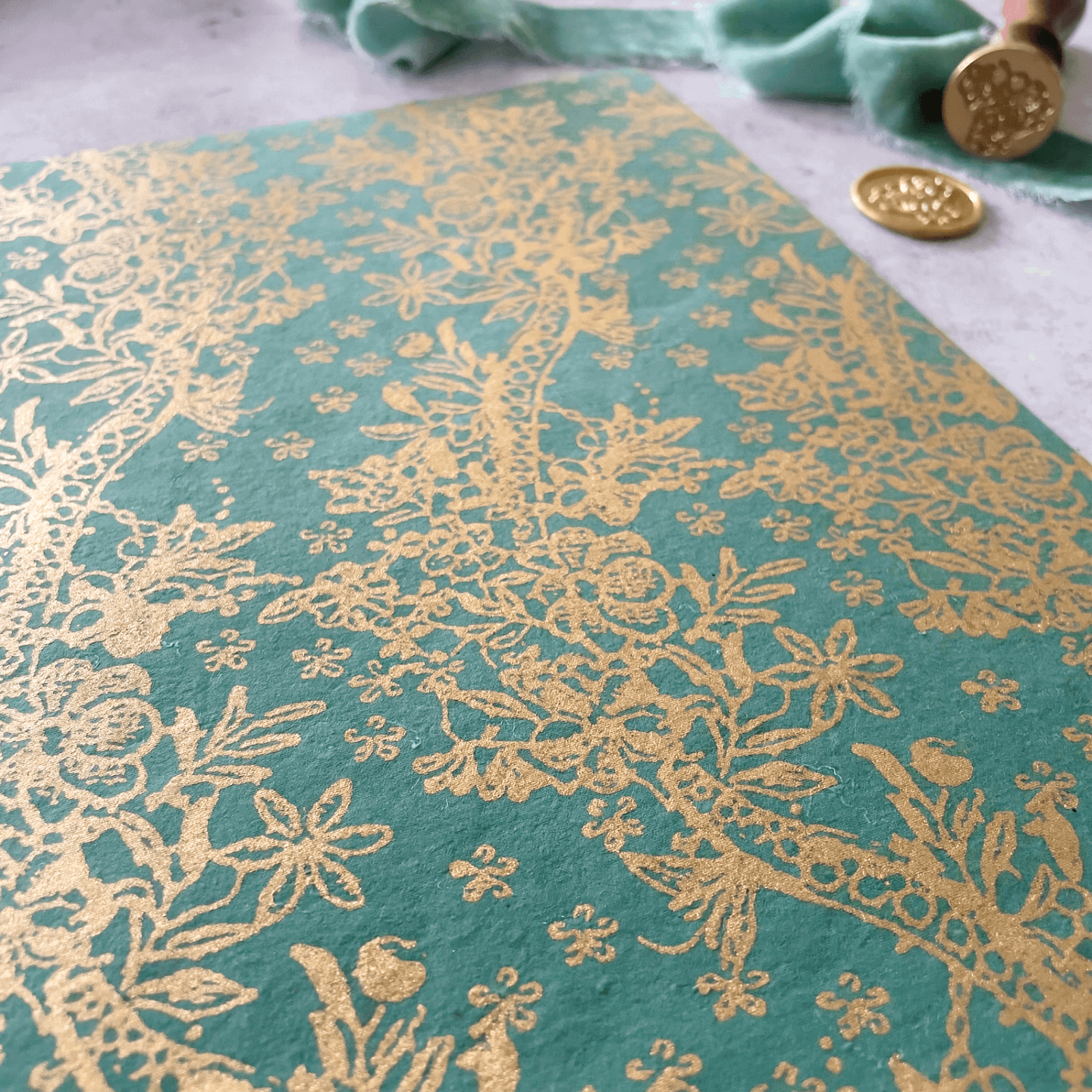 jade-green-and-gold-recycled-paper