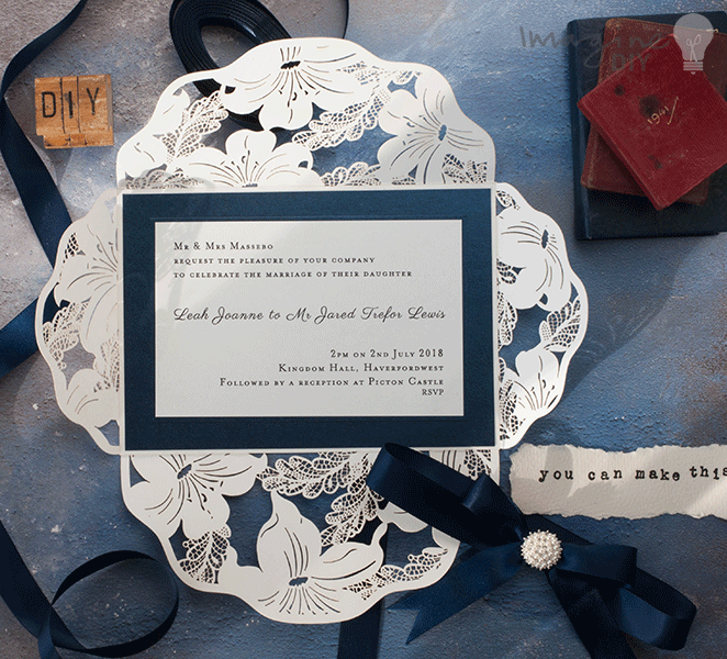 lily_laser_cut_invitation_with_navy_and_white_detail