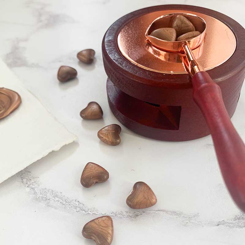 wooden-wax-melting-furnace-with-spoon-rose-gold